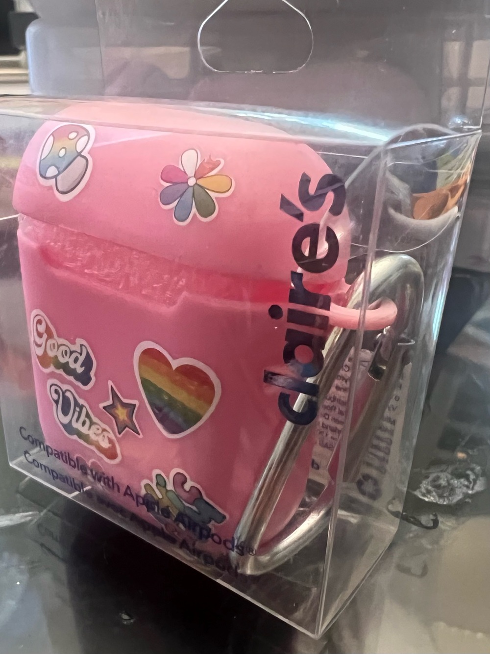 Claire’s Pink AirPods Case with Rainbow Heart Stickers